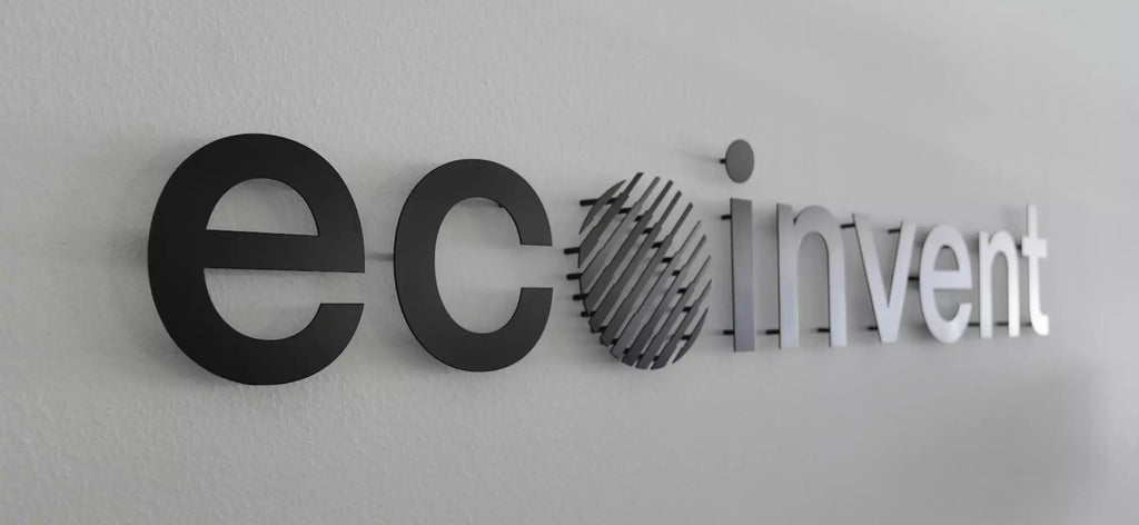 ecoivent black 2D non-lit aluminium cut-out logo on white wall