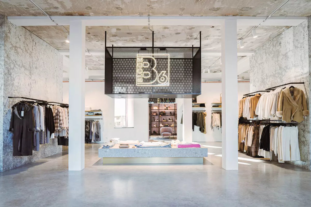 Block6 retail store with glass neon logo - photo credit: Patrick Breugl, interior design: MALLUVIA innenarchitektur