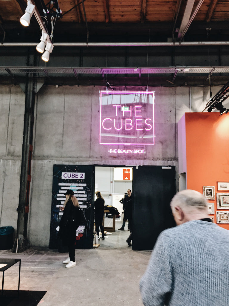 suspended neon sign at premium fair berlin 2017