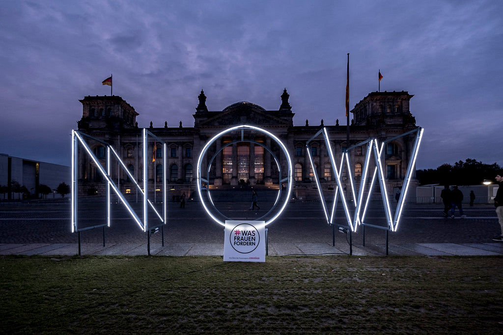 NOW outdoor neon construction in front of the Reichstag building in Berlin 2017