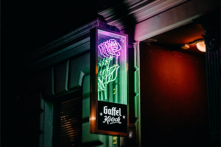 Rosebud Bar in Cologne - encased projecting neon sign